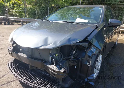 2016 Toyota Corolla Le z USA, uszkodzony, nr VIN 2T1BURHE4GC631268